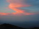 Sunset colors on clouds above.